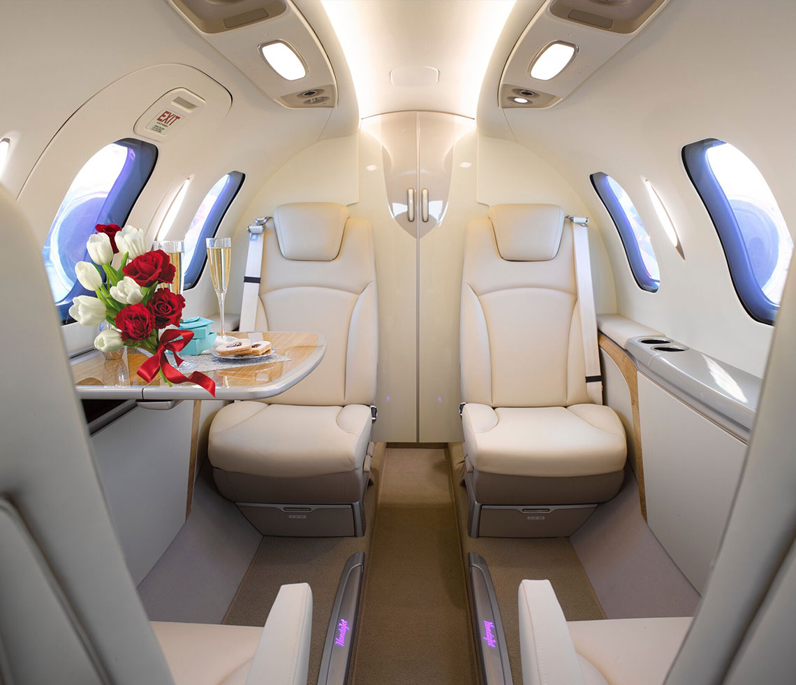 HondaJet interior of private jet cabin with roses on display