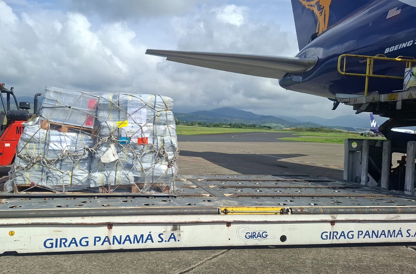 emergency materials being loaded onto cargo plane