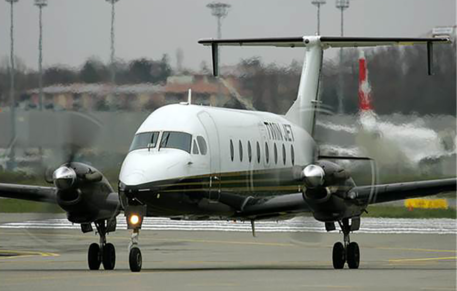 Beech 1900 cargo charter aircraft preparing for takeoff