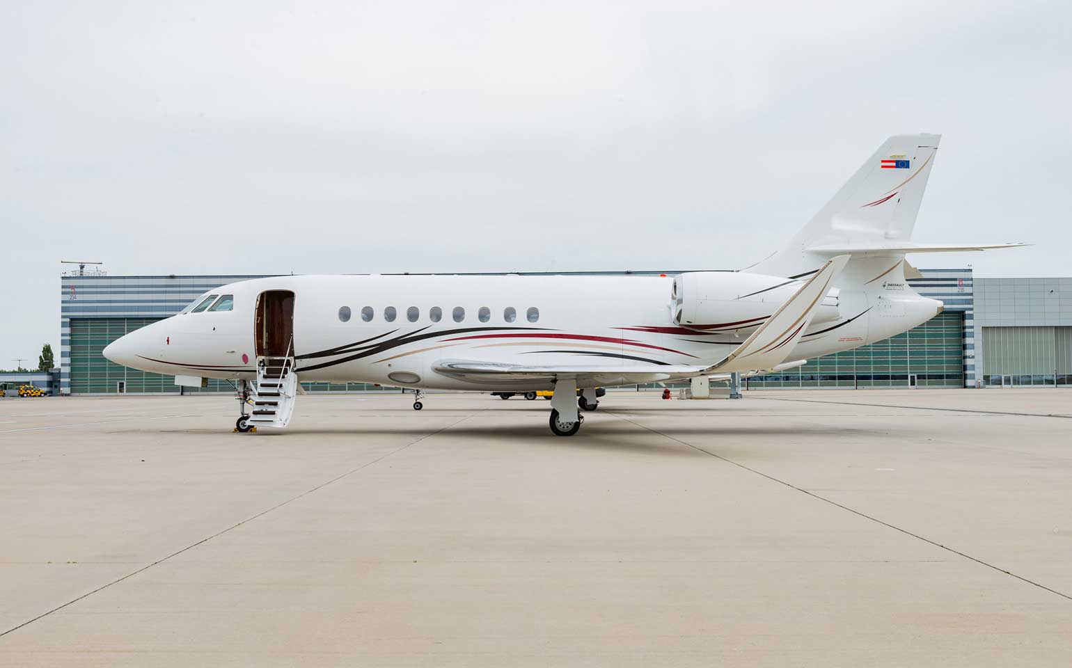 Dassault Falcon 2000 private jet charter at FBO runway
