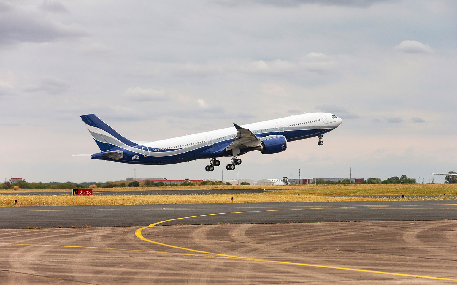 Airbus A330-200 private aircraft charter flight taking off at airport