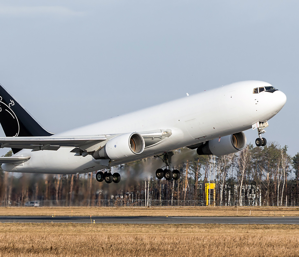 Boeing B767-200F cargo charter aircraft freight plane taking off